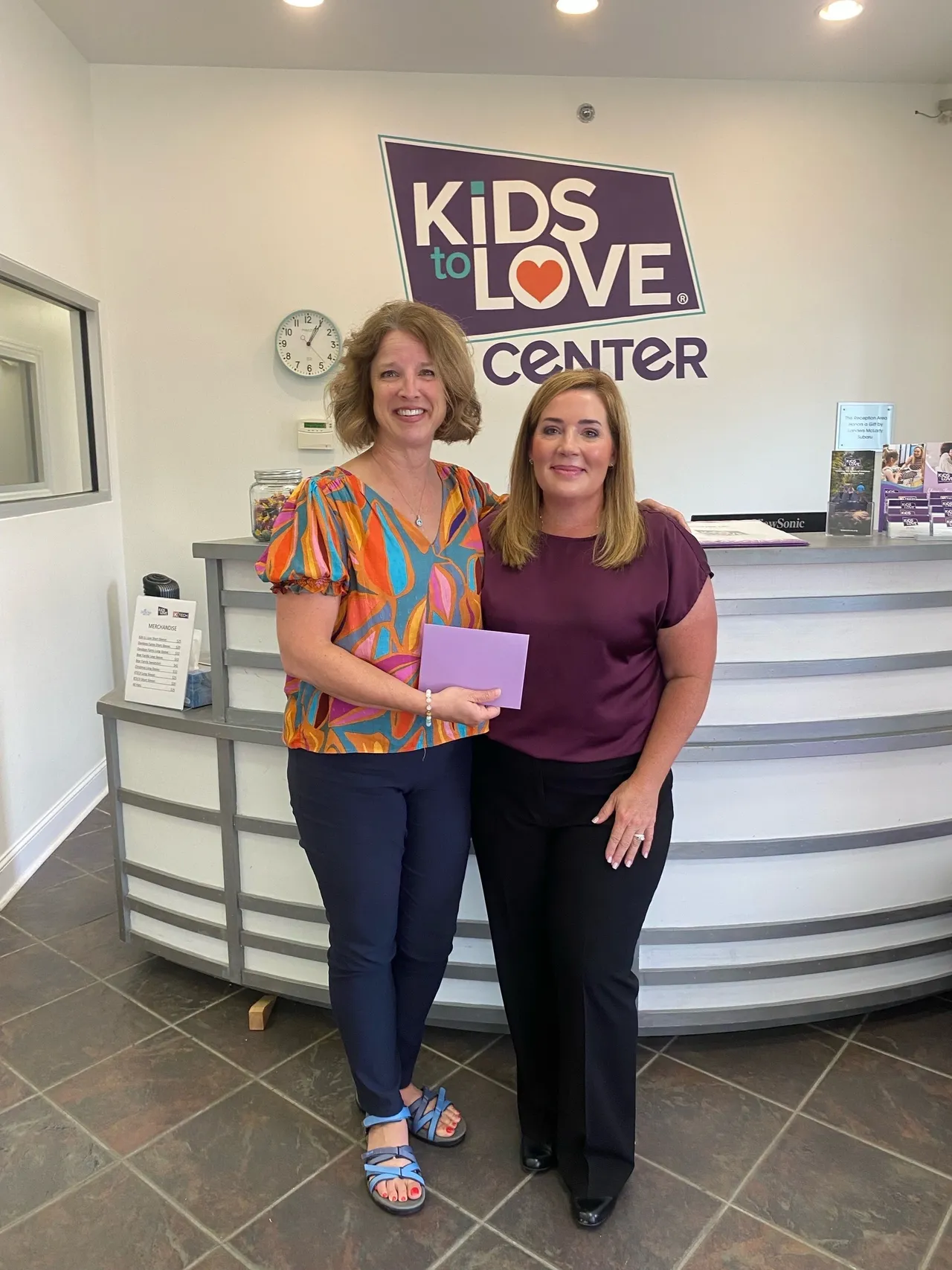 Smiling women at Kids to Love Center