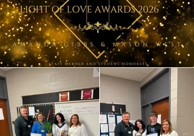 Awards ceremony banner and honorees group photo