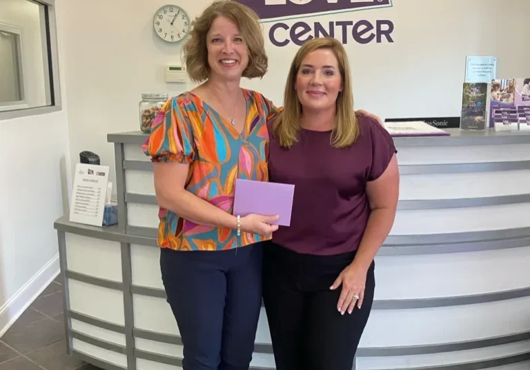 Smiling women at Kids to Love Center