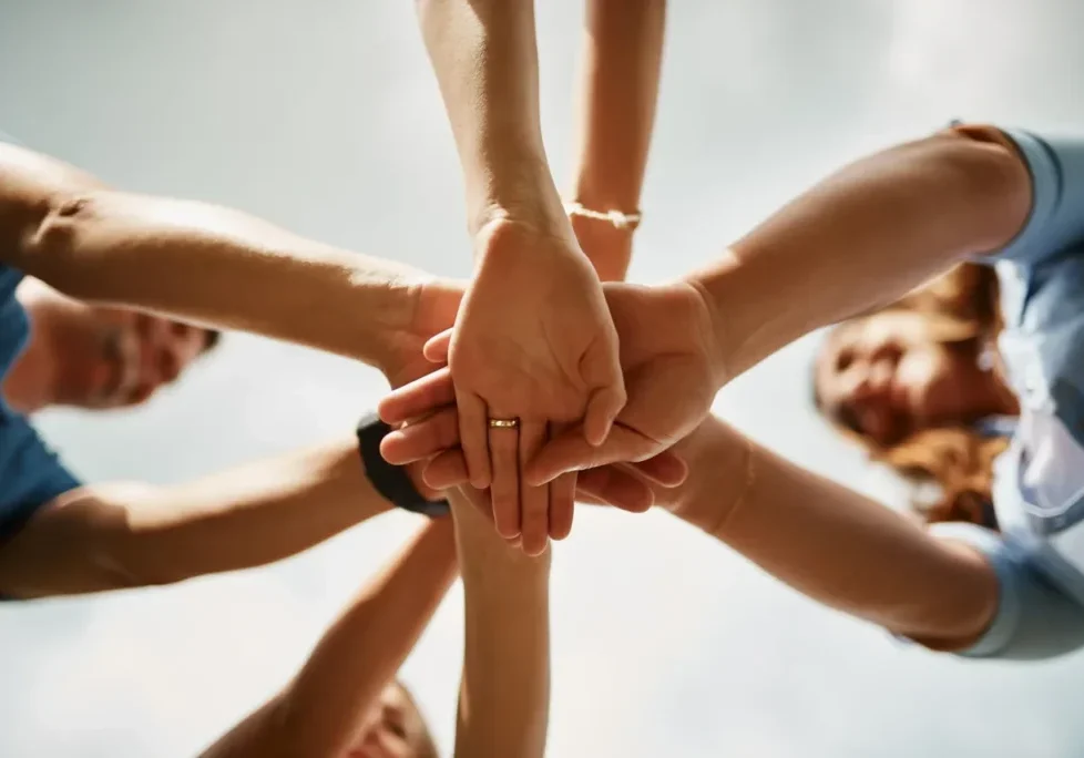 Group unity with hands together